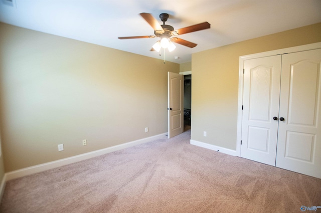 29960 Copper Run Dr, Harvest, AL 35749 - unfurnished bedroom with light carpet, a closet, and a ceiling fan