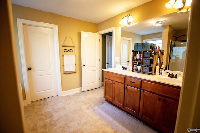 bathroom featuring vanity and walk in shower