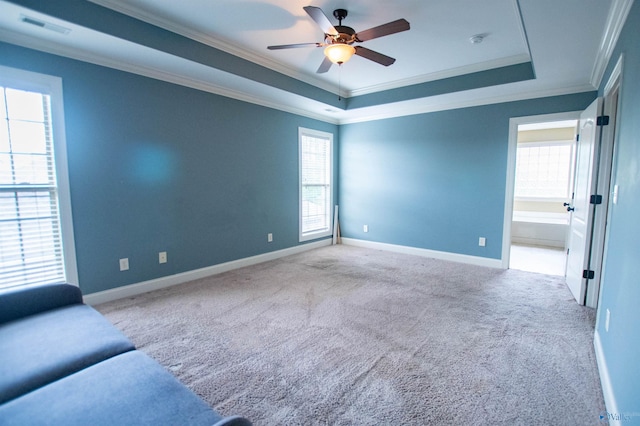 29960 Copper Run Dr, Harvest, AL 35749 - carpeted empty room featuring crown molding, a tray ceiling, ceiling fan, and a smoke detector