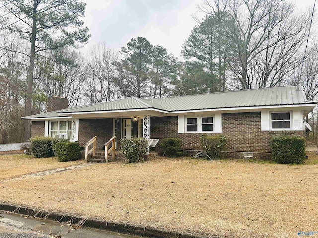 single story home with a porch