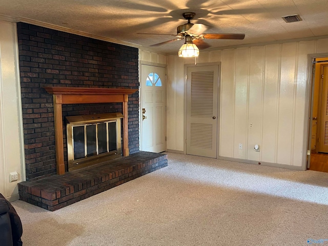 unfurnished living room with light colored carpet, a textured ceiling, a brick fireplace, and ceiling fan