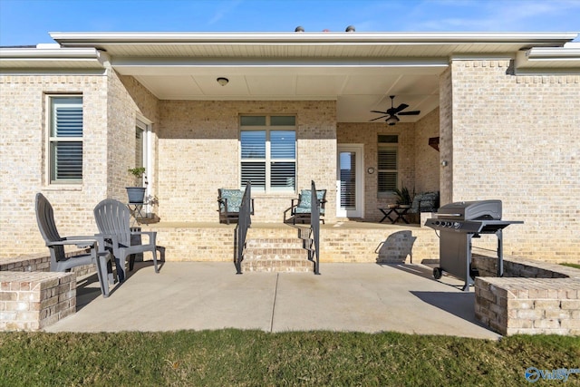 view of patio / terrace featuring area for grilling and ceiling fan