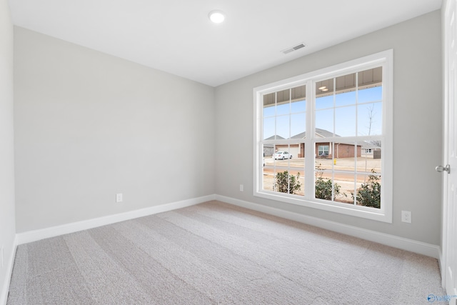 empty room featuring carpet floors