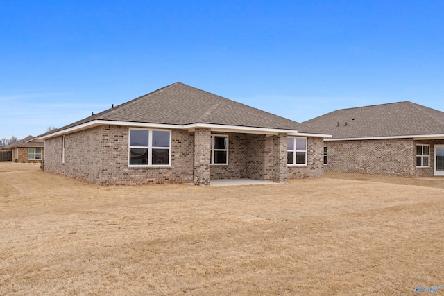 rear view of house featuring a patio