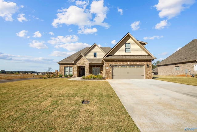 craftsman-style home featuring a garage and a front lawn