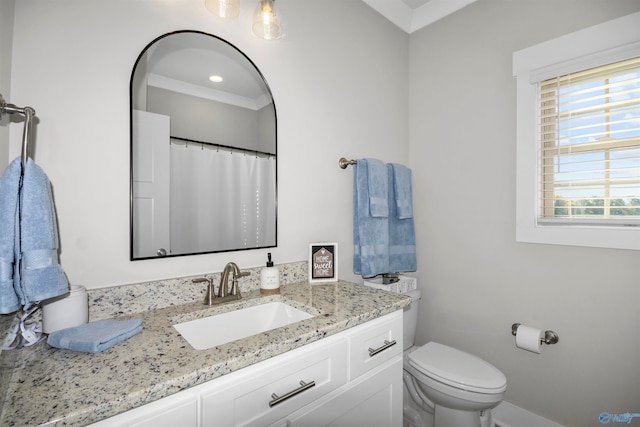 bathroom with vanity and toilet