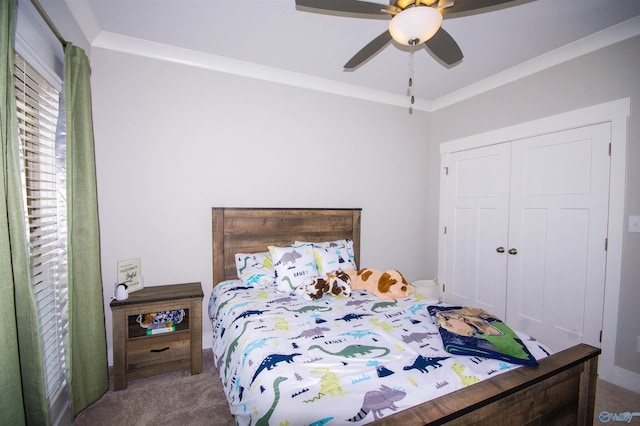 bedroom with carpet flooring, a closet, and ceiling fan