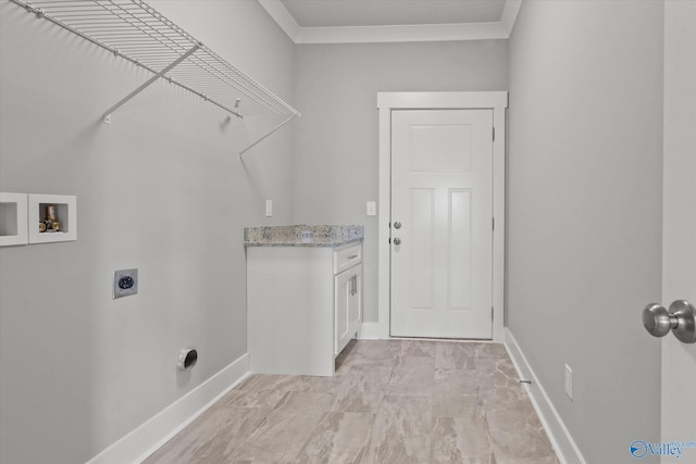 laundry room with hookup for an electric dryer, washer hookup, and crown molding