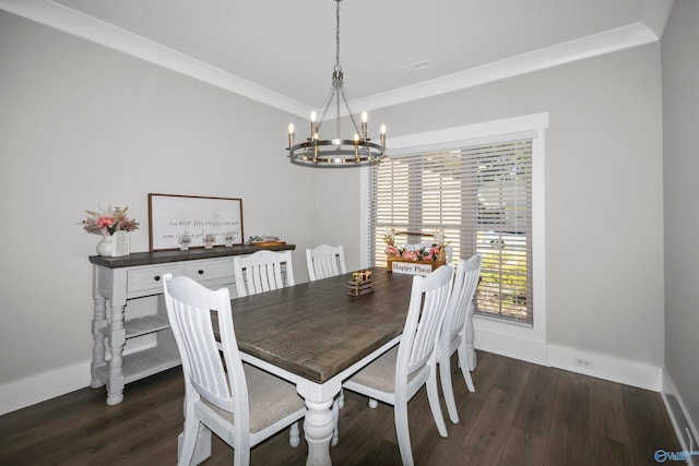 dining room featuring ornamental molding, a chandelier, and dark hardwood / wood-style floors