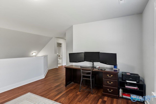 office featuring dark hardwood / wood-style floors and vaulted ceiling