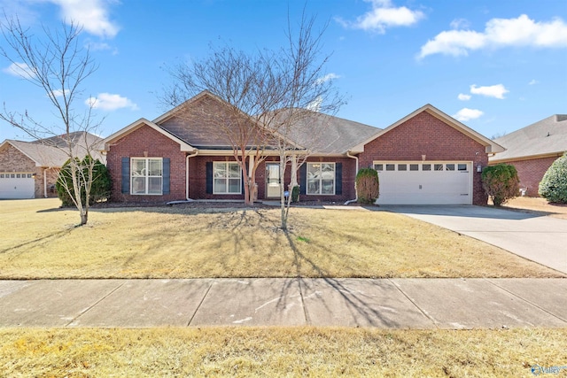 ranch-style house with a garage, brick siding, concrete driveway, and a front lawn