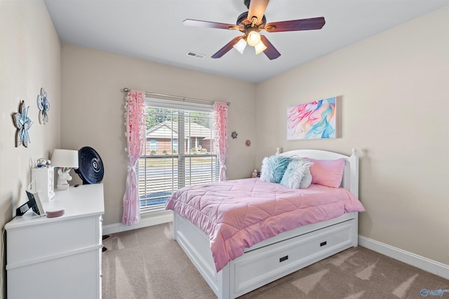 bedroom with visible vents, baseboards, and carpet floors