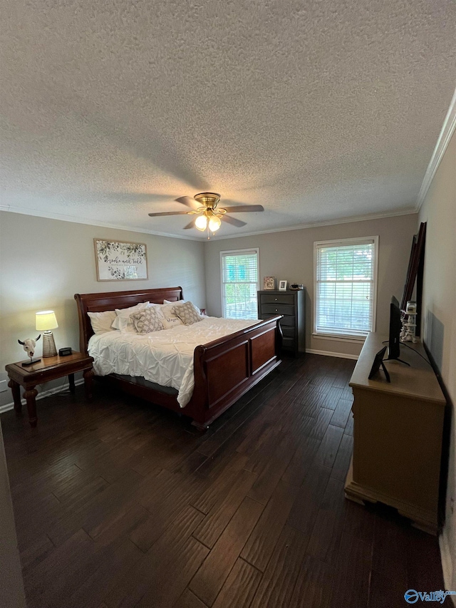 bedroom featuring ceiling fan, dark hardwood / wood-style flooring, ornamental molding, and a textured ceiling