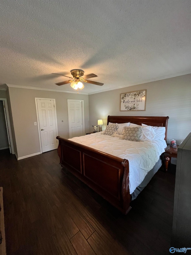 unfurnished bedroom with a textured ceiling, wood-type flooring, and ceiling fan