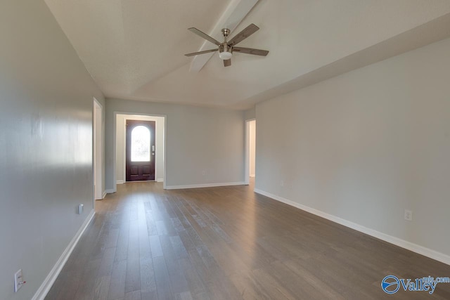 interior space with ceiling fan and dark wood-type flooring