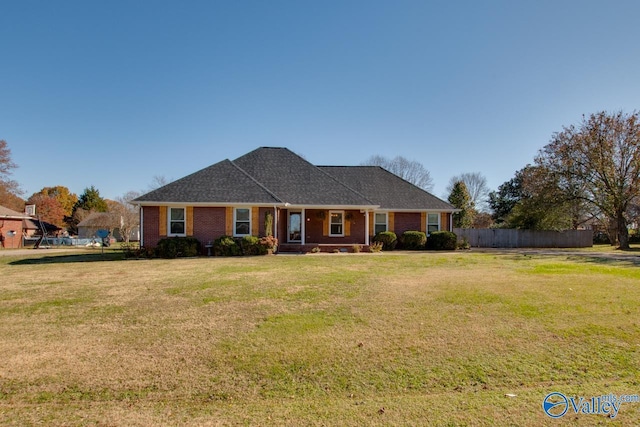 ranch-style house with a front lawn