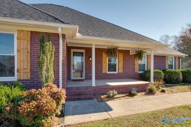 doorway to property featuring a porch