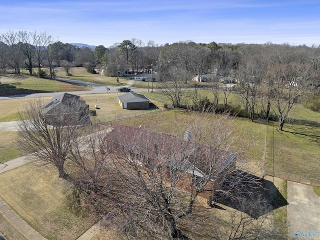 drone / aerial view with a mountain view and a rural view