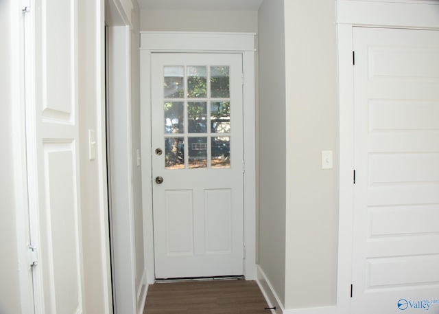 doorway featuring dark hardwood / wood-style flooring