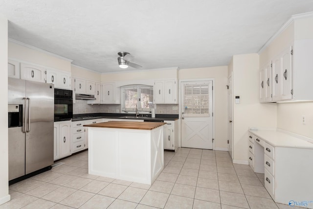 kitchen featuring white cabinetry, sink, ceiling fan, and appliances with stainless steel finishes