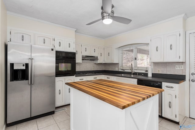 kitchen with a kitchen island, sink, white cabinets, stainless steel fridge with ice dispenser, and oven