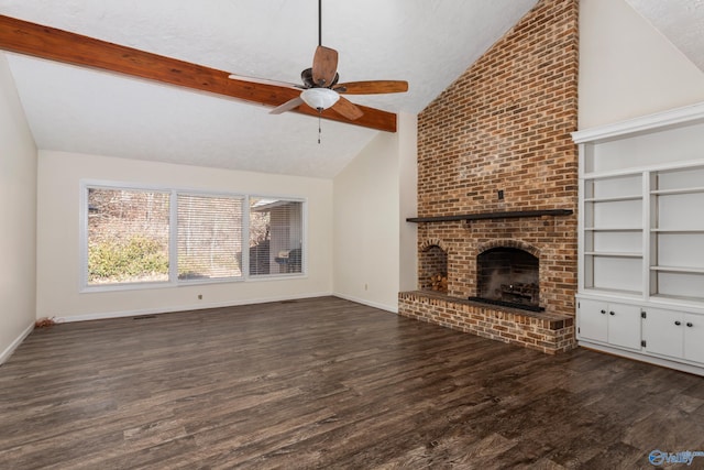 unfurnished living room with beamed ceiling, a fireplace, ceiling fan, and dark wood-type flooring