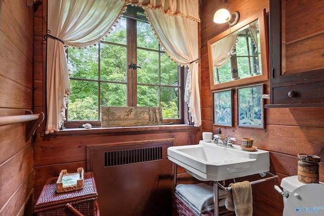 LOT1 Moon Lake Rd, Mentone, AL 35984 - bathroom featuring wooden walls, radiator heating unit, and plenty of natural light