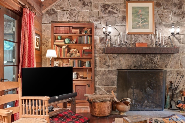 LOT1 Moon Lake Rd, Mentone, AL 35984 - living room featuring a fireplace with raised hearth, built in features, wood finished floors, and lofted ceiling