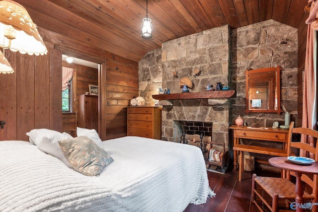 LOT1 Moon Lake Rd, Mentone, AL 35984 - bedroom featuring lofted ceiling, wood ceiling, hardwood / wood-style floors, wooden walls, and a stone fireplace