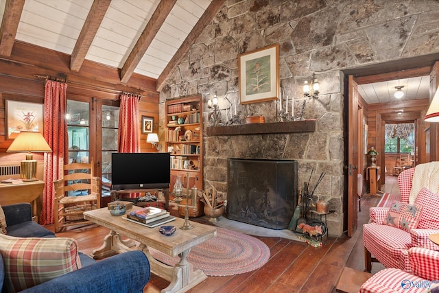 LOT1 Moon Lake Rd, Mentone, AL 35984 - living room featuring wood-type flooring, wooden walls, a wooden ceiling with exposed beams, a stone fireplace, and high vaulted ceiling
