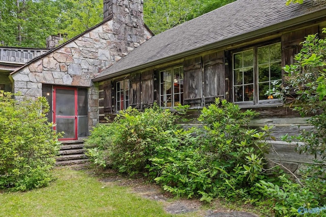 LOT1 Moon Lake Rd, Mentone, AL 35984 - back of house with a chimney, stone siding, and a shingled roof