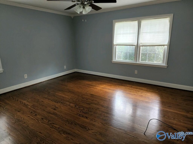 spare room with ornamental molding, ceiling fan, and dark hardwood / wood-style flooring