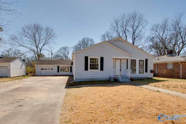 bungalow with crawl space, driveway, and an attached garage