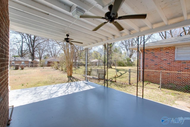 view of patio / terrace with a fenced backyard and a ceiling fan