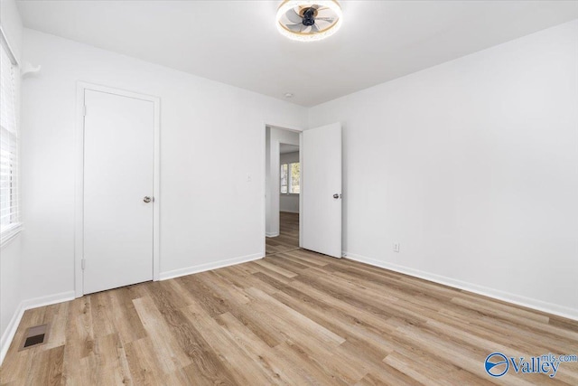 unfurnished bedroom with light hardwood / wood-style floors