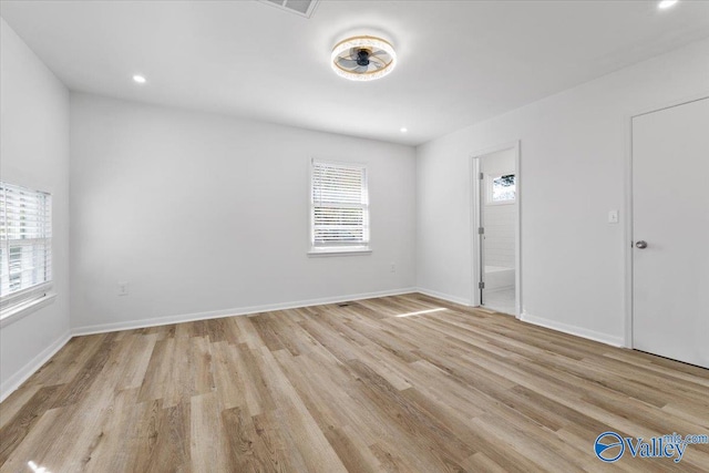 interior space featuring light hardwood / wood-style flooring and a wealth of natural light