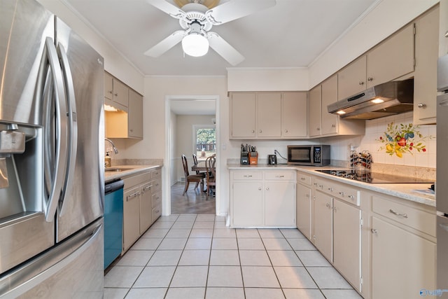 kitchen featuring appliances with stainless steel finishes, light tile patterned floors, ceiling fan, and crown molding