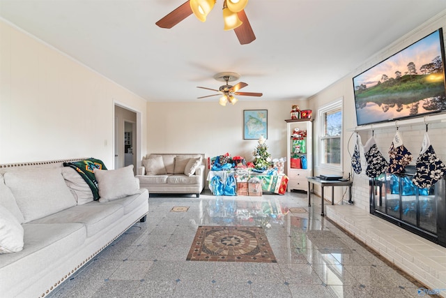 living room with ceiling fan and crown molding