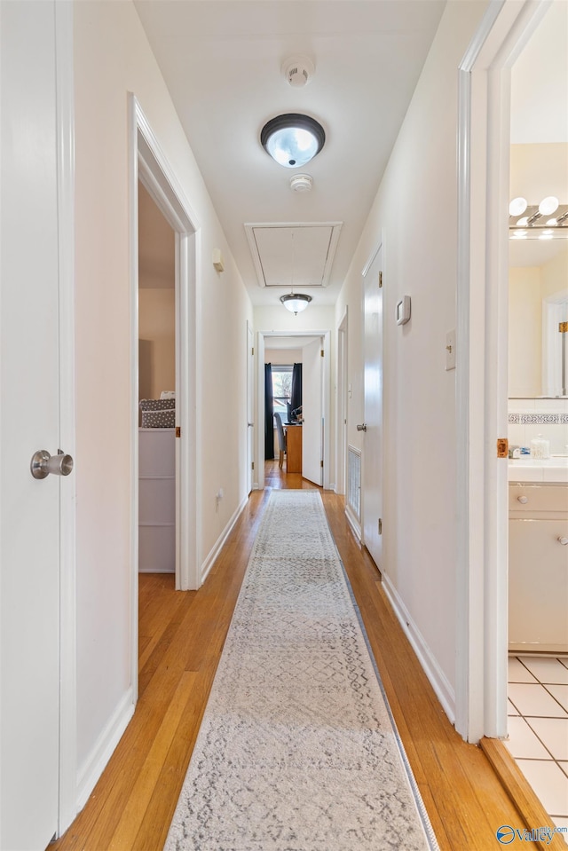 hall featuring light wood-type flooring