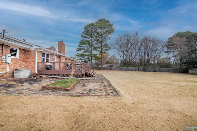 view of yard with a deck