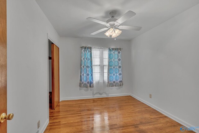 1013 Hermosa Ave, Gadsden, AL 35901 - unfurnished bedroom featuring light wood-style flooring, a ceiling fan, and baseboards