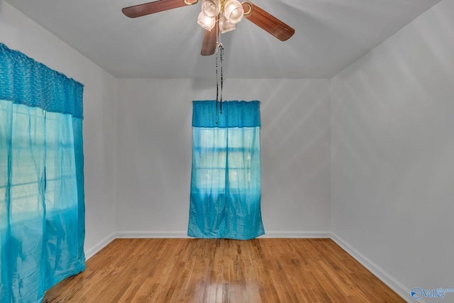 unfurnished room with ceiling fan and light hardwood / wood-style flooring