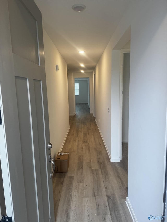 hallway featuring light wood-type flooring