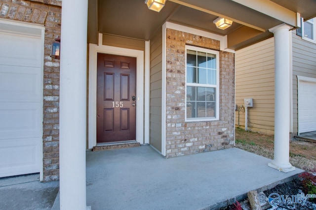 entrance to property with a porch