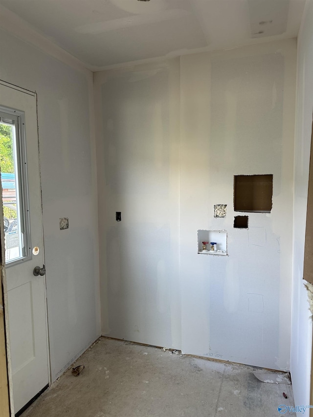 laundry room featuring laundry area and washer hookup