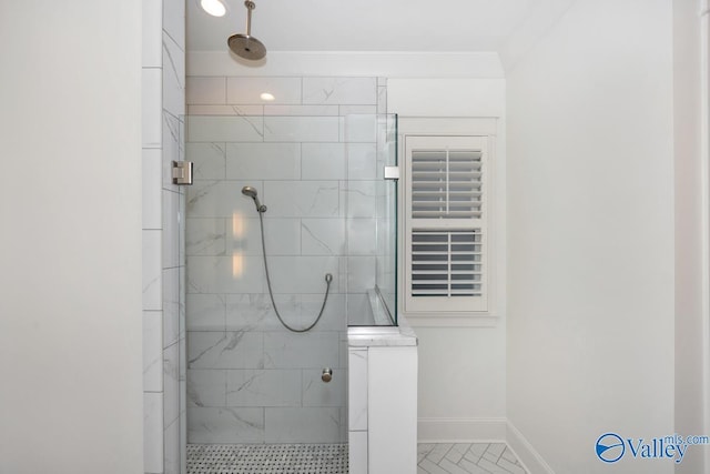 full bathroom with baseboards, marble finish floor, and tiled shower