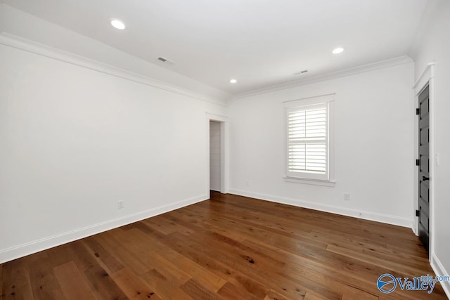 unfurnished room with ornamental molding, baseboards, hardwood / wood-style floors, and recessed lighting