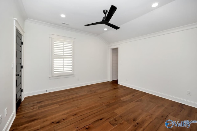 spare room featuring crown molding, visible vents, lofted ceiling, and ceiling fan