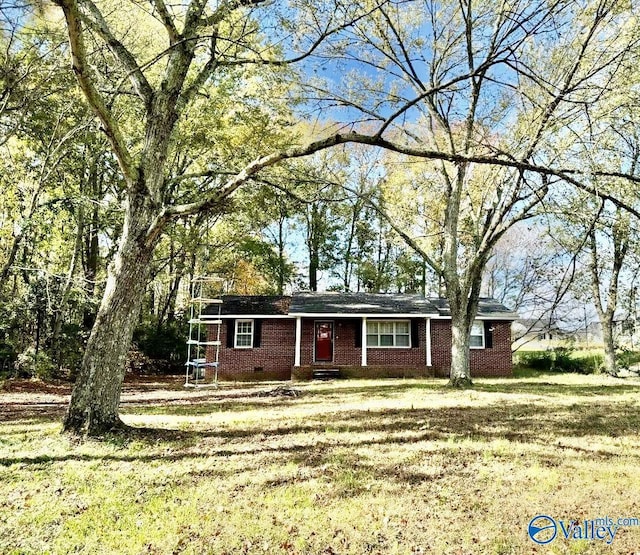 1520 Balch Rd, Madison, AL 35757 - ranch-style home featuring brick siding, a front lawn, and crawl space