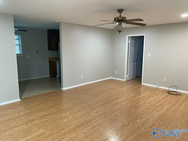 1520 Balch Rd, Madison, AL 35757 - spare room with a ceiling fan, light wood-style flooring, and baseboards
